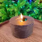 Black battery operated Christmas wax candle for tabletop decor