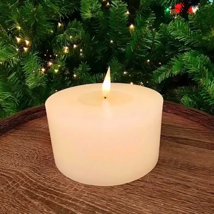 Battery operated Christmas wax candle in white colour for tabletop decor