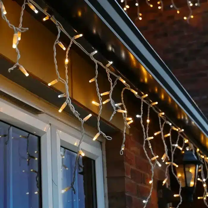 Warm white with ice white flash LED icicle Christmas lights for indoor and outdoor use