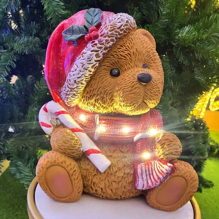 Sitting teddy bear with candy cane Christmas table top decoration