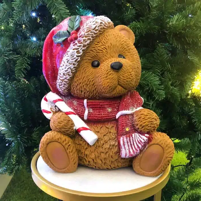 Sitting teddy bear with candy cane Christmas table top decoration