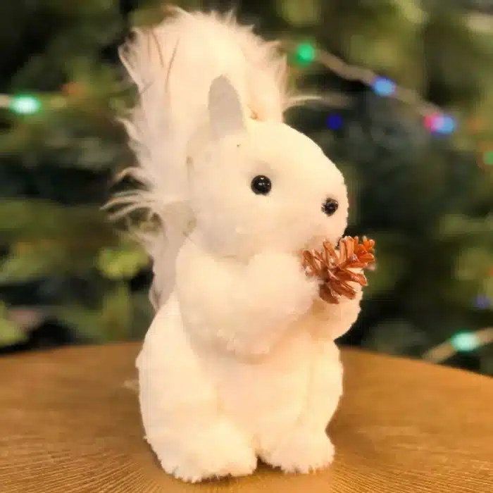 Fluffy squirrel with pine cone Christmas decoration 26cm tall close up view